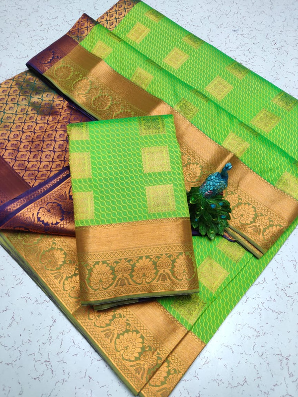 Semi Silk Saree in Rani Pink Colour with Bright Bhotta's and Extreme Jari work Elegant Design Putta