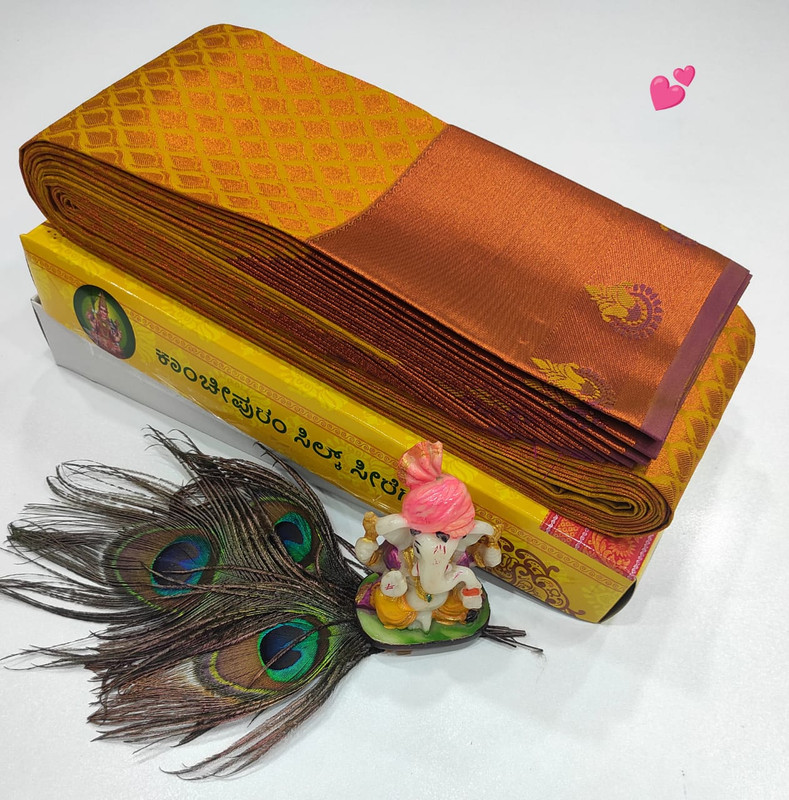 Wedding Saree in Mustard Yellow Colour with Pastel Pink and Golden Design along with Heavy Zari and Rich Pallu