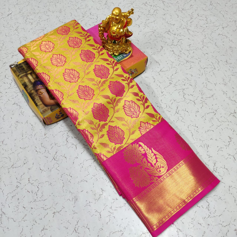 Shinning Pure Tissue Silk Saree in Yellow and Pink Colour with Floral Design and Golden Zari Spread with Grand Wide Border