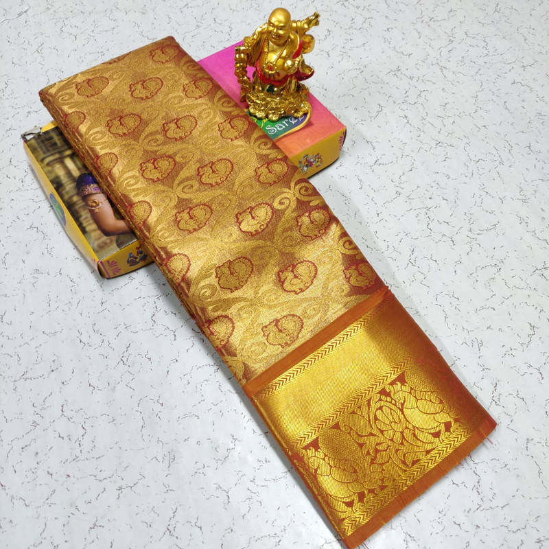 Pure Tissue Silk Saree Golden Colour.
