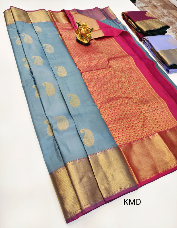 Kanchipuram Silk Saree with Wide Border in Lemon Yellow and White with Navy Blue Design along with Rich silver Work Zari at the Pallu