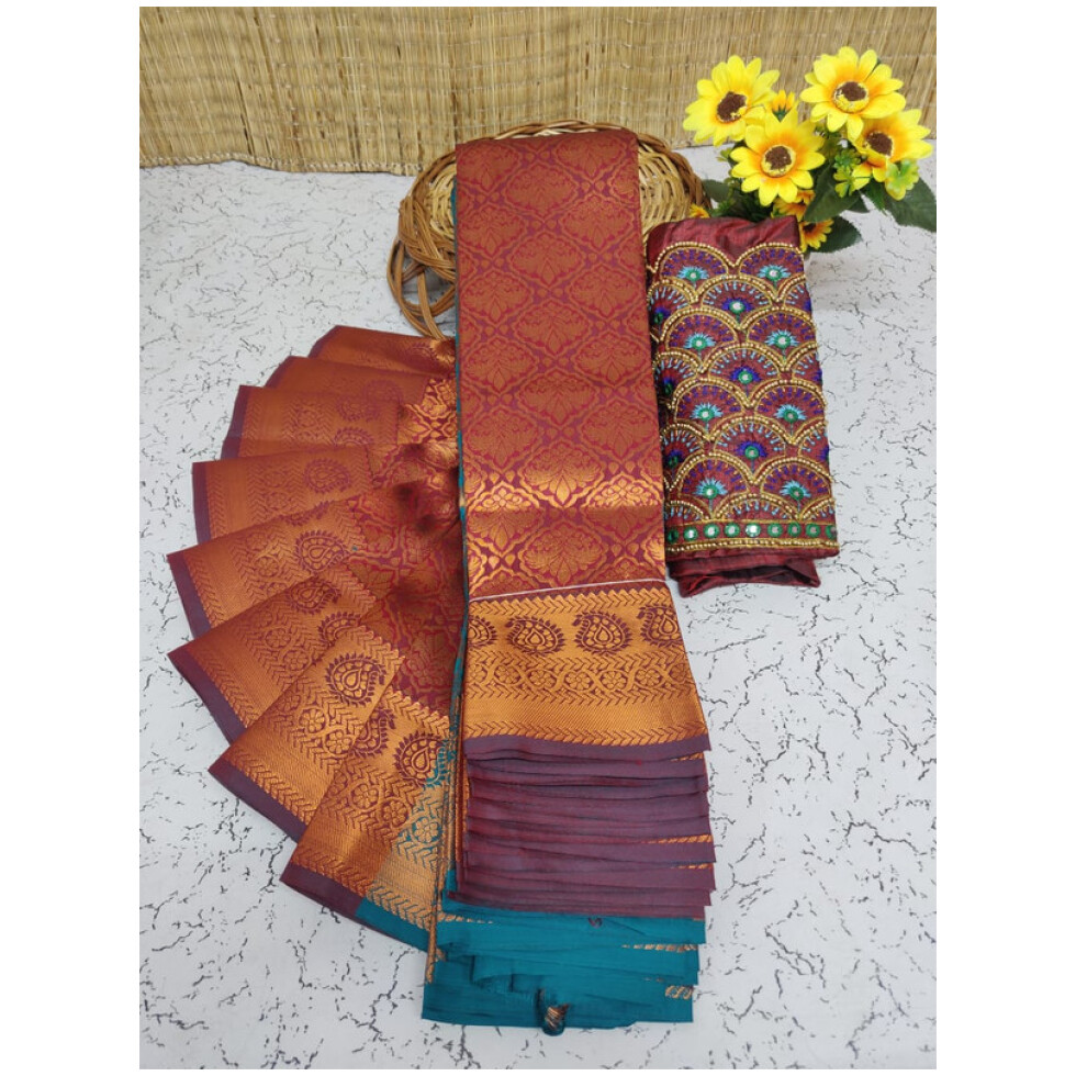 Soft Semi Silk Saree, Well used for Festivals, Weddings, Gatherings . Shinning Reddish with Putta's in the whole saree aling with the beautiful Wide Zari Golden Design Border and Rich work Palllu in Vine colour. The Blouse pices attached looks extremly gorgeous.