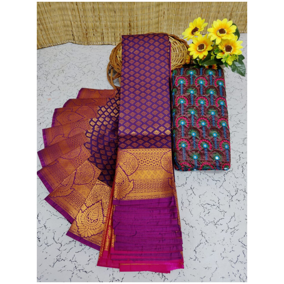 Soft Semi Silk Saree, Well used for Festivals, Weddings, Gatherings . Shinning Maganta with Putta's in the whole saree aling with the beautiful Wide Zari Golden Design Border and Rich work Palllu in Rani Pink colour. The Blouse pices attached looks extremly gorgeous.