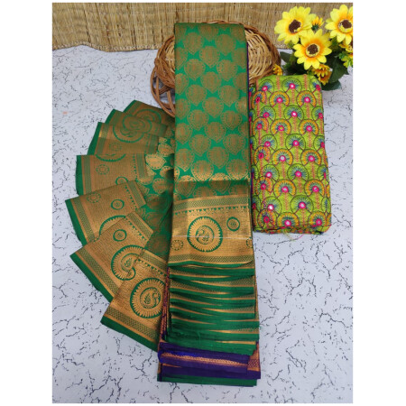 Soft Semi Silk Saree, Well used for Festivals, Weddings, Gatherings . Shinning Green with Putta's in the whole saree aling with the beautiful Wide Zari Golden Design Border and Rich work Palllu in Bottle Green colour. The Blouse pices attached looks extremly gorgeous.