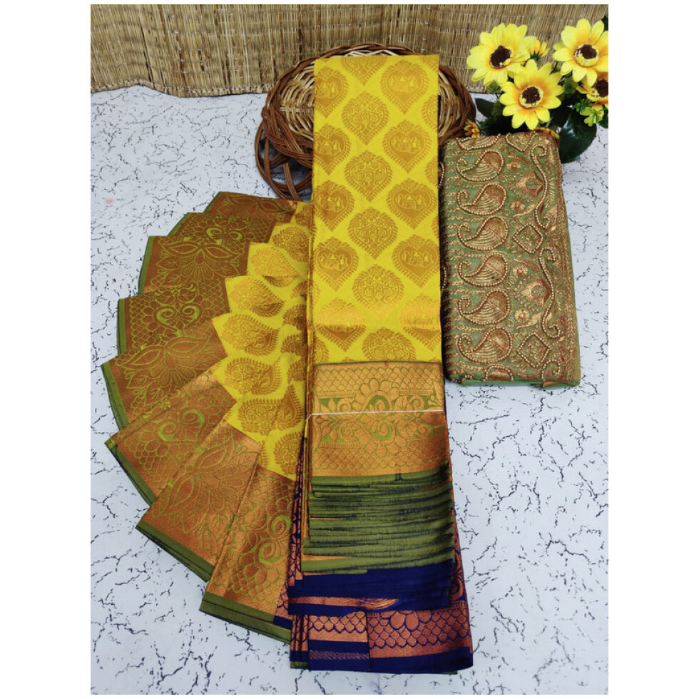 Soft Semi Silk Saree, Well used for Festivals, Weddings, Gatherings . Shinning Lemon Yellow with Putta's in the whole saree aling with the beautiful Wide Golden Zari Design with Mehandi colour Border and Rich work Palllu in Royal Blue colour. The Blouse pices attached looks extremly gorgeous.