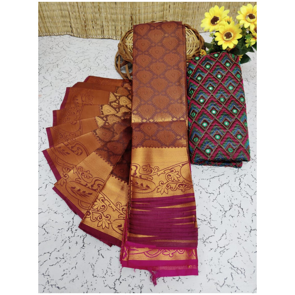 Soft Semi Silk Saree, Well used for Festivals, Weddings, Gatherings . Shinning Dark Pastel Biscuit Colour with Putta's in the whole saree aling with the beautiful Wide Golden Zari Design Border and Rich work Pallu in Rani Pink colour. The Blouse pices attached looks extremly gorgeous.